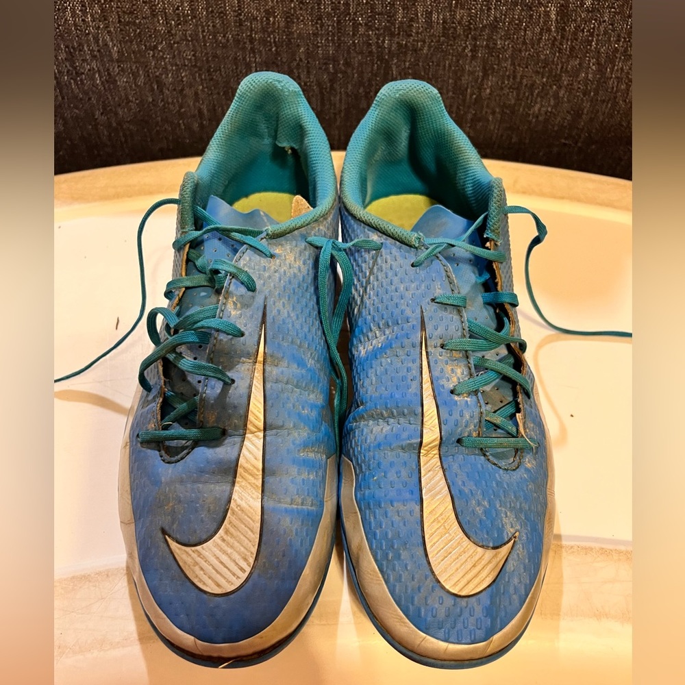Nike men’s blue soccer cleats, size 9